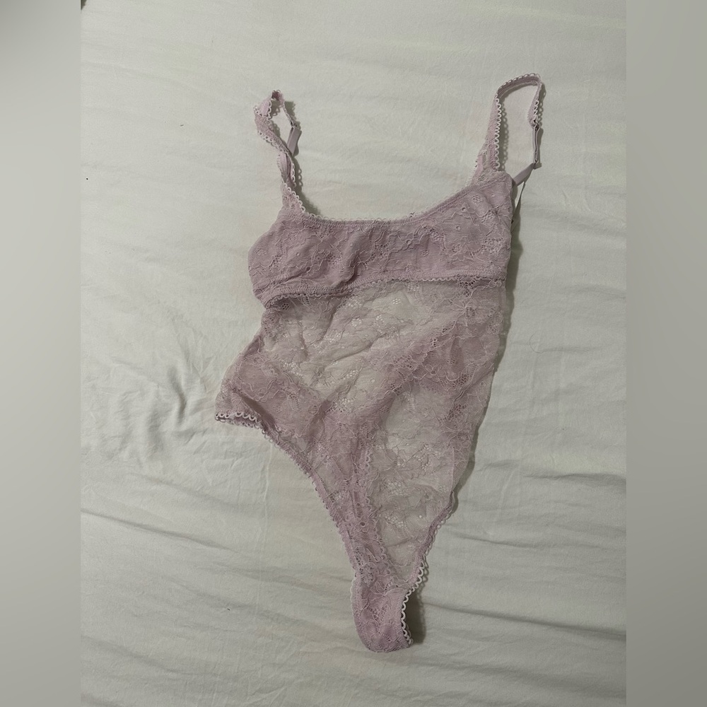Urban outfitters bodysuit! Very cute but never got to wear!